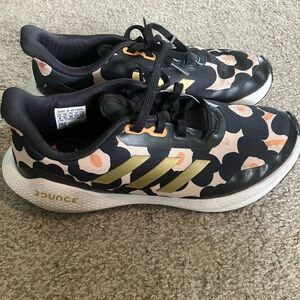 Adidas Black and Gold Sneakers Modern Athletic Style